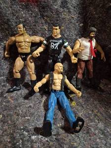 lot 12 image: Wrestling Action Figures Lot 4 Figures Articulated