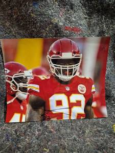 lot 54 image: Signed Kansas City Chiefs NFL Football Photo 8x10 - Not Authenticated