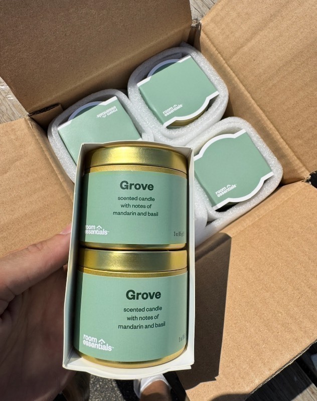 lot 390 image: New Case of Room Essentials Grove Scented Candles, Mandarin Basil (8pc Set)