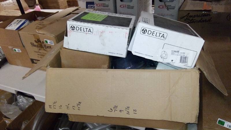 lot 300 image: Box Of MIsc Items. Shower Head, Shower Faucet, Expansion Valve, Gas Ignition Control, Etc.