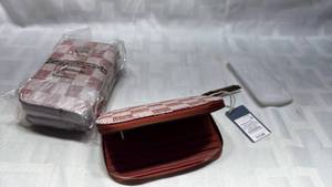 lot 829 image: Universal Thread Checkered Zip Wallet Lot of 2