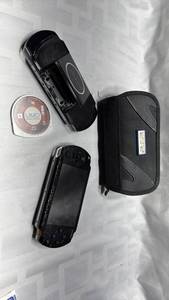 lot 843 image: Sony PSP 1000 Console with NBA 2K12 Game and Case