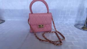 lot 850 image: Pink Quilted Mini Handbag with Chain Strap