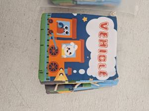 lot 10056 image: Ridgoy Vehicle Soft Fabric Book Set (2 Books)