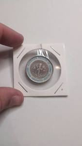 lot 525 image: American Museum of Atomic Testing Encased One Dime Coin