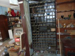 lot 3533 image: Metal Pigeon Hole Cabinet - - not sure how it is attached - u can remove it - but dont break anything
