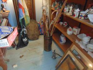 lot 3554 image: Brass Umbrella Holder with Several Walking Canes and Yardsticks
