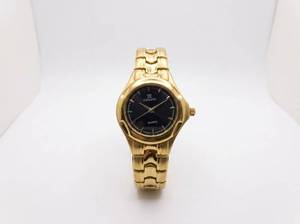 lot 63922 image: Collection Quartz Gold-Tone Wristwatch Black Dial
