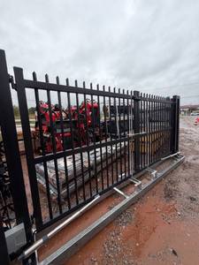 lot 10307 image: Unused 14ft Electric Double Swing Driveway Gate with Remote (DG14LW-P10FH-DZ)