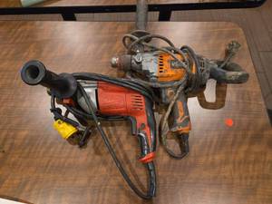 lot 18651 image: Milwaukee 12in Hammer Drill w Ridgid Mud Mixer