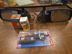 lot 18667 image: Pair of Side View Mirrors w Tail Lamp Circuit Board, and Oil Filters