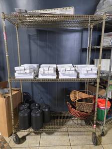 lot 12703 image: Metal Metro Shelving Unit w Casters  Contents Not Included