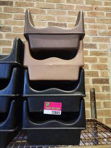 lot 12805 image: (4) Molded Plastic Booster Seats in Black, Tan and Brown