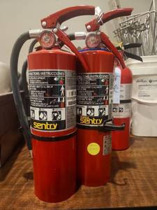 lot 12851 image: (2) Ansul Sentry Dry Chemical Fire Extinguisher w Hose, Gauge and Bracket