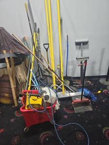 lot 18746 image: Janitorial Tool Lot Mop Bucket, Brooms, Shovel, Rake, Dustpans, Roller Stand