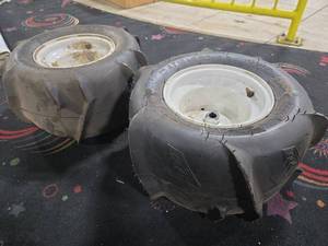 lot 18759 image: Pair of Sand Star AT18x9.50-8 Paddle Tires Mounted on White Steel Wheels
