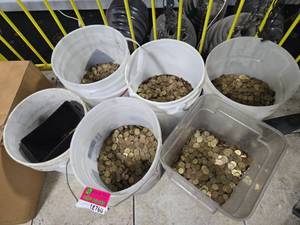 lot 18760 image: Large Lot of Brass-Colored Round Tokens in 5 Buckets and 1 Clear Container