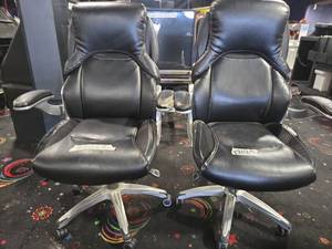 lot 22029 image: True Wellness Black Faux Leather High-Back Office Chair, Flip-Up Arms, Lot of 2
