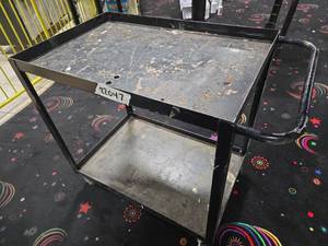 lot 22047 image: Black Steel 2-Shelf Rolling Utility Cart with Push Handle and 4 Casters