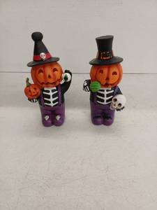 lot 12151 image: Halloween Pumpkin Head Skeleton Figures with Hats Pair