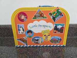 lot 40 image: Little Passports A Global Adventure Early Explorers Suitcase Set