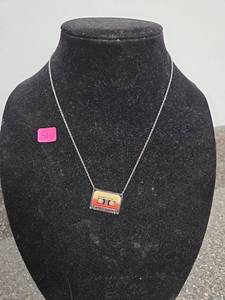lot 51 image: Awesome Mix Vol. 2 Cassette Tape Pendant Necklace