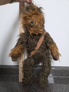 lot 62 image: Chewbacca Plush Figure with Bandolier Strap Approximately 24 inches
