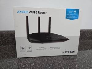 lot 77 image: NETGEAR AX1800 WiFi 6 Router RAX10