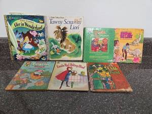 lot 96 image: 7 Childrens Picture Books Little Golden Books Disney Alice Tawny Lion