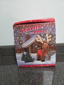 lot 104 image: Reindeer on the Roof Christmas Gift Set with Plush Reindeer and Activity Book