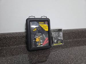 lot 106 image: Stanley Ratcheting Pistol Grip Screwdriver Set and License Plate Fastener Kits