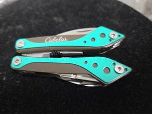 lot 129 image: Cabelas Folding Knife Turquoise Handle MultiTool