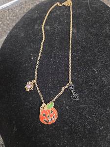 lot 130 image: Gold Tone Chain Necklace Halloween Charms