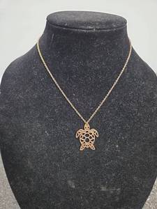 lot 132 image: Sea Turtle Openwork Pendant Necklace Gold Tone Chain