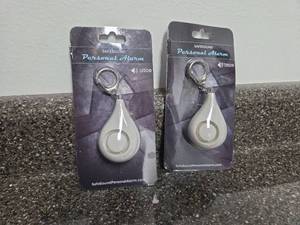 lot 149 image: SafeSound Personal Alarm 125DB Keychain Set of 2