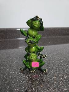 lot 150 image: Stacked Green Frog Figurine with Black Accents and Brass Details