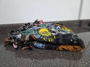lot 170 image: Small Star Wars Character Fleece Blanket with Tied Fringe Edge