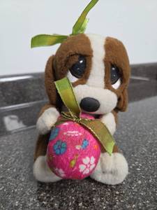 lot 186 image: Vintage Plush Dog Ornament with Pink Floral Ball and Green Ribbon Hanger