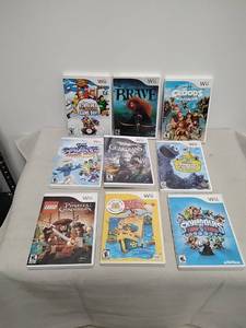 lot 24 image: Nintendo Wii Games Lot 9 Titles Brave Croods Guardians Pirates