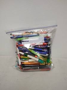 lot 25 image: Big bag of pens and pencils.