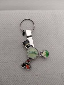 lot 41 image: DC Comics Justice League Keychain with Interchangeable Charms
