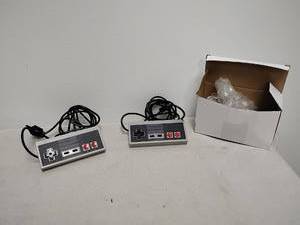 lot 42 image: Nintendo NES Controller Lot 2 Units with Cords