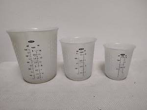 lot 48 image: OXO Measuring Cups Set 3-Piece ml oz cups