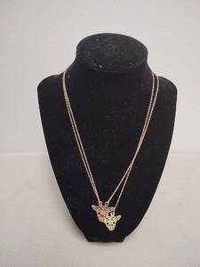 lot 72 image: Openwork Giraffe Head Pendant Necklaces