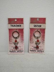 lot 81 image: Angel Keychain Charm Travel Safety Teacher Sister 2-Pack
