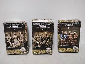 lot 111 image: Duck Dynasty Puzzle 14 x 11 inches 300 Piece Lot of 3