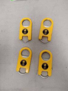 lot 138 image: Terminator Genisys Yellow Bottle Opener Keychain Set 4 Pack