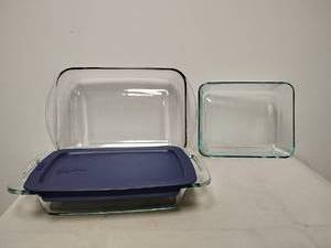 lot 141 image: Lot of three baking dishes, two Pyrex one anchor hooking