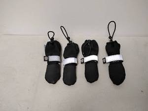 lot 172 image: Canada Pooch four piece dog shoes