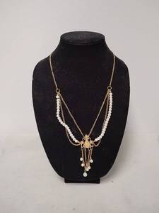 lot 173 image: Gold-Tone Chain Necklace with White Beads and Ornate Pendant